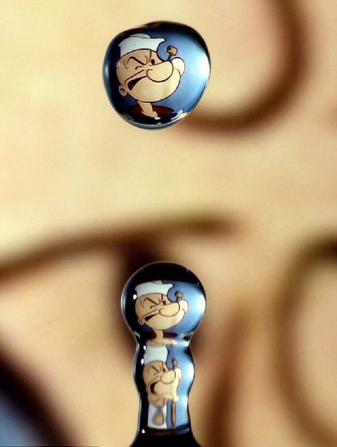以色列摄影师用高速相机捕捉水滴中的卡通人物